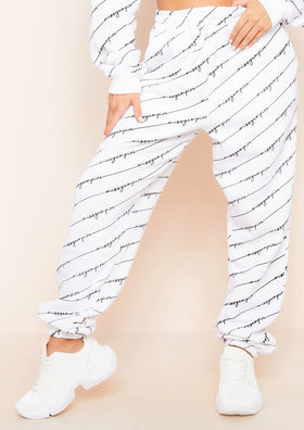 Eliora White Missy Empire Repetitive Slogan Joggers Eliora White Missy Empire Repetitive Slogan Joggers