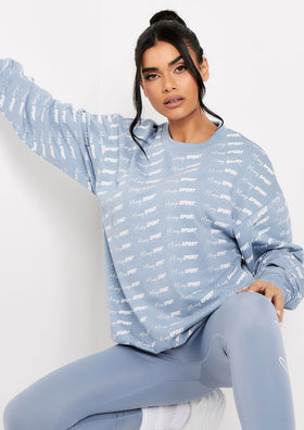 Cali Mid Blue Missy Sport Repeat Branded Print Oversized Sweatshirt