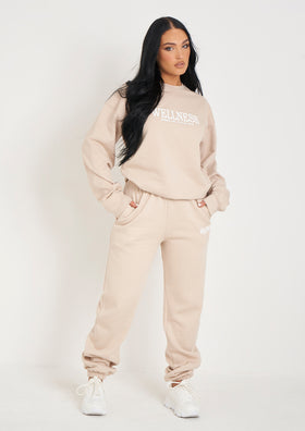 Jolie Beige Wellness Embroidered Cuffed Joggers Jolie Beige Wellness Embroidered Cuffed Joggers