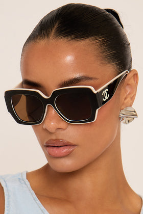 Side Logo Detail White Trim Oversized Sunglasses In Black And Nude